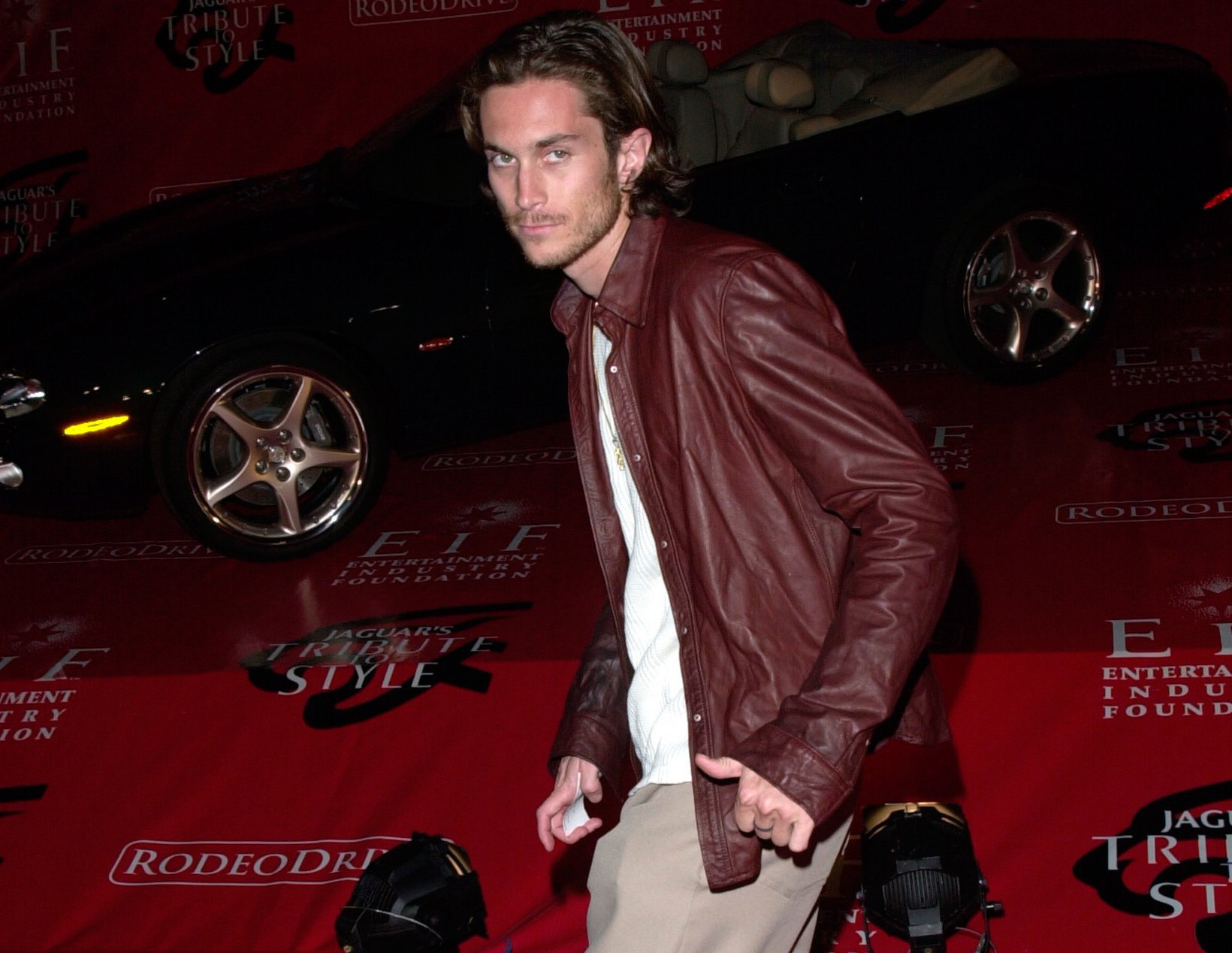 Actor OLIVER HUDSON at the Jaguar Tribute to Style Gala at Santa Monica Airport. 18MAR2001 in burgundy shirt