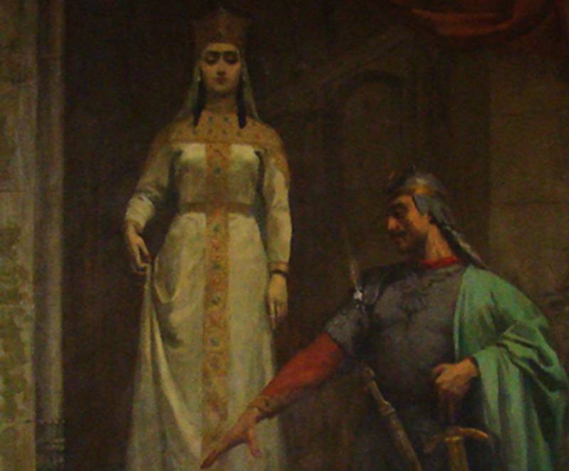 Queen Tamar in a white dress and a crown