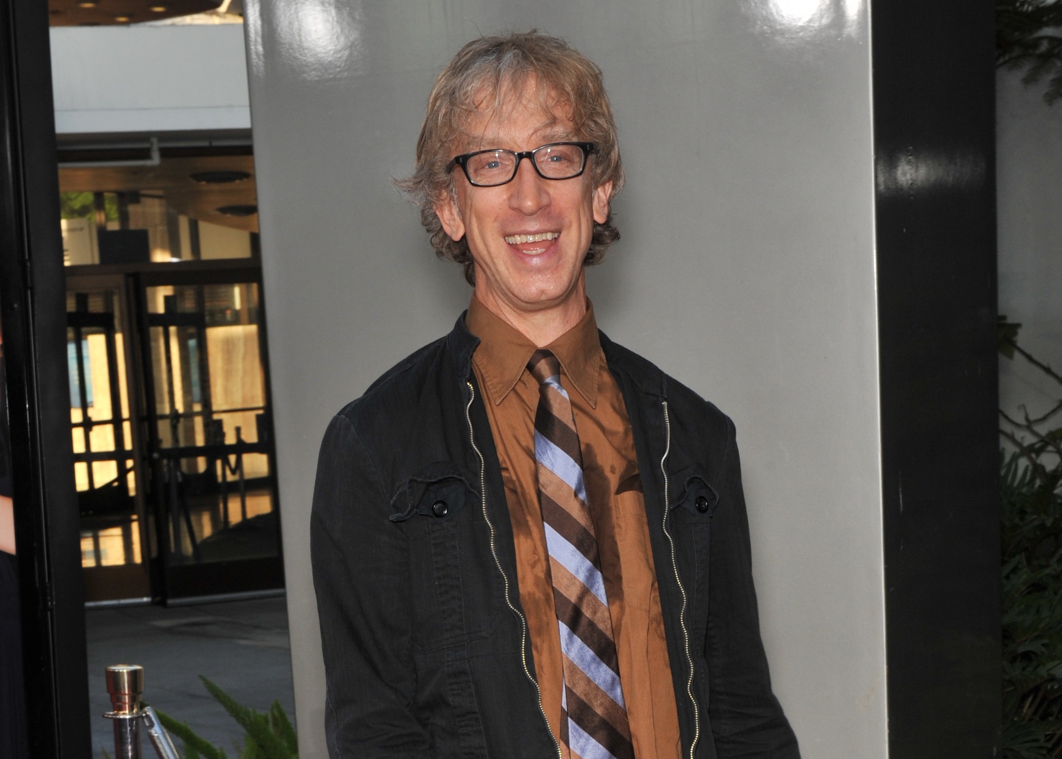 Andy Dick is walking and smiling at camera - 2009