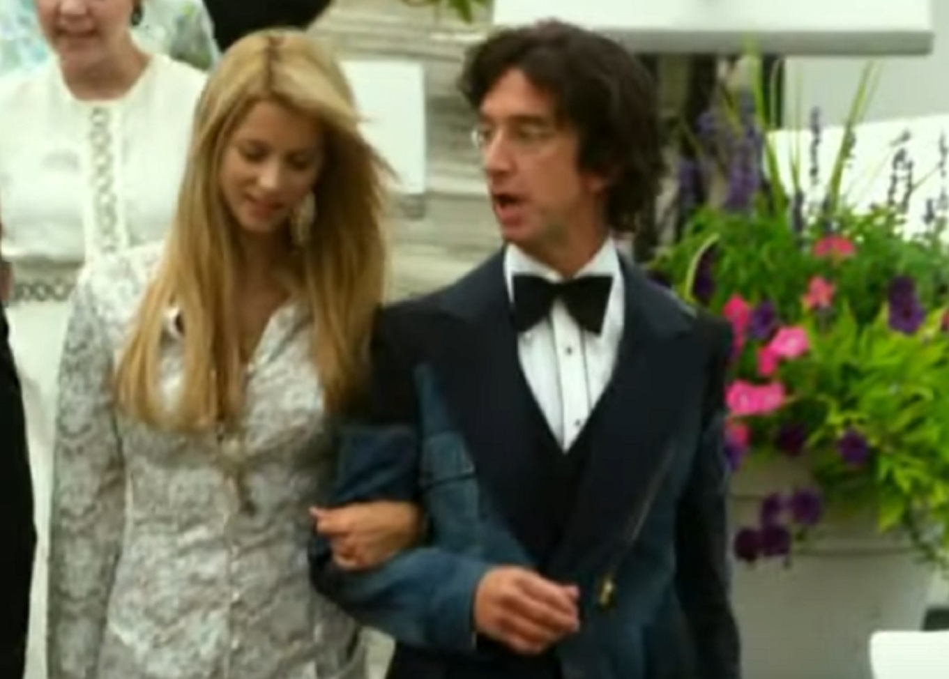Screenshot: Andy Dick is walking with woman ,looking at side  - from Freaky Deaky (2012)