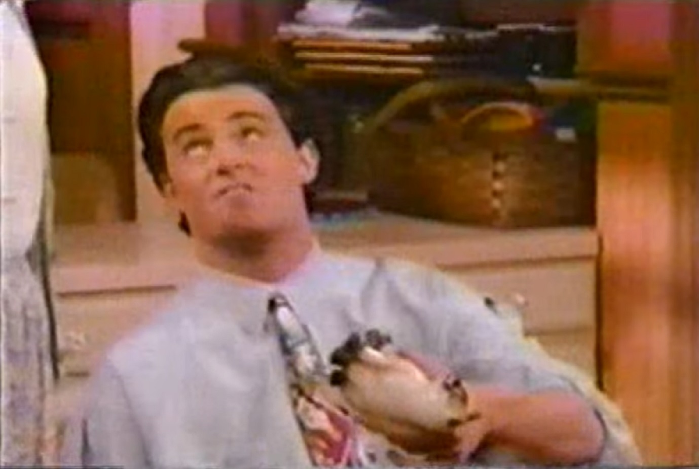 Screenshot: Matthew Perry wearing white shirt and tie ,looking up - from Home Free (1993)