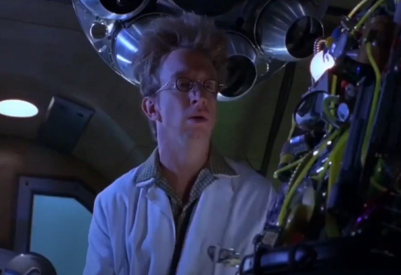 Screenshot: Andy Dick wearing white coat and looking surprised - from Inspector Gadget (2009)