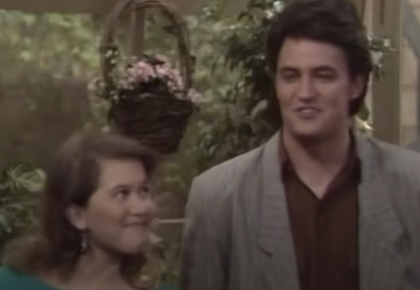 Screenshot: Matthew Perry is smiling and walking next to woman - from Growing Pains (1985-92)