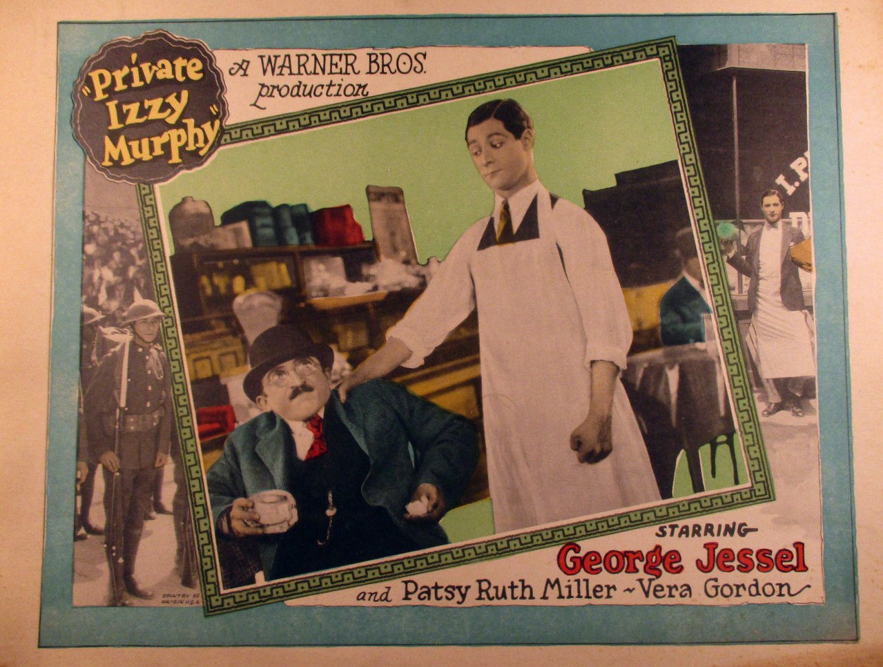 Lobby card for the American comedy drama film Private Izzy Murphy (1926) with George Jessel wearing white apron