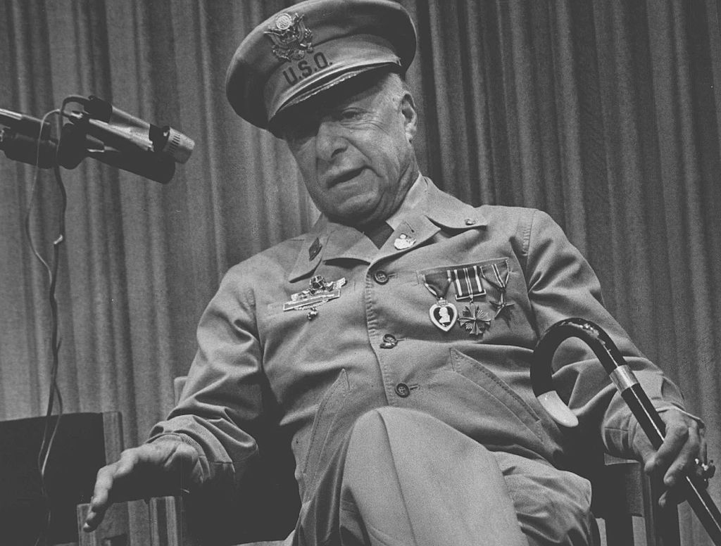 George Jessel in uniform performing