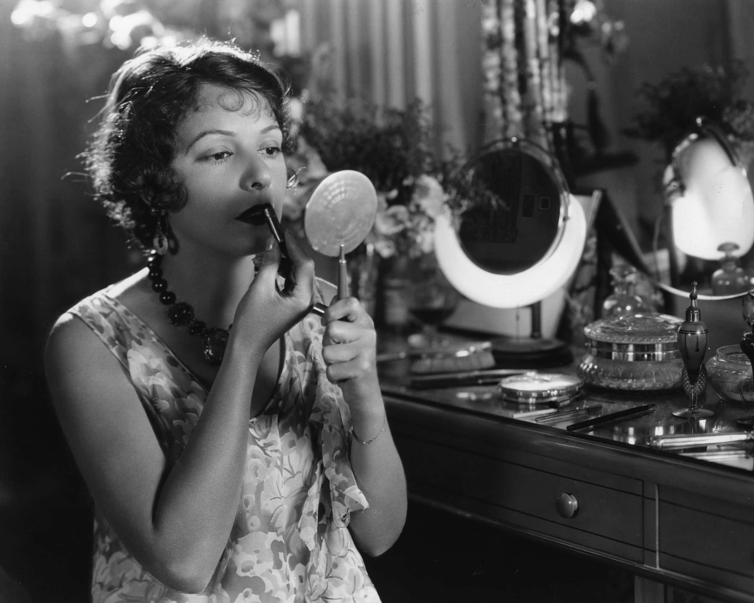 Norma Talmadge circa 1919 putting makeup