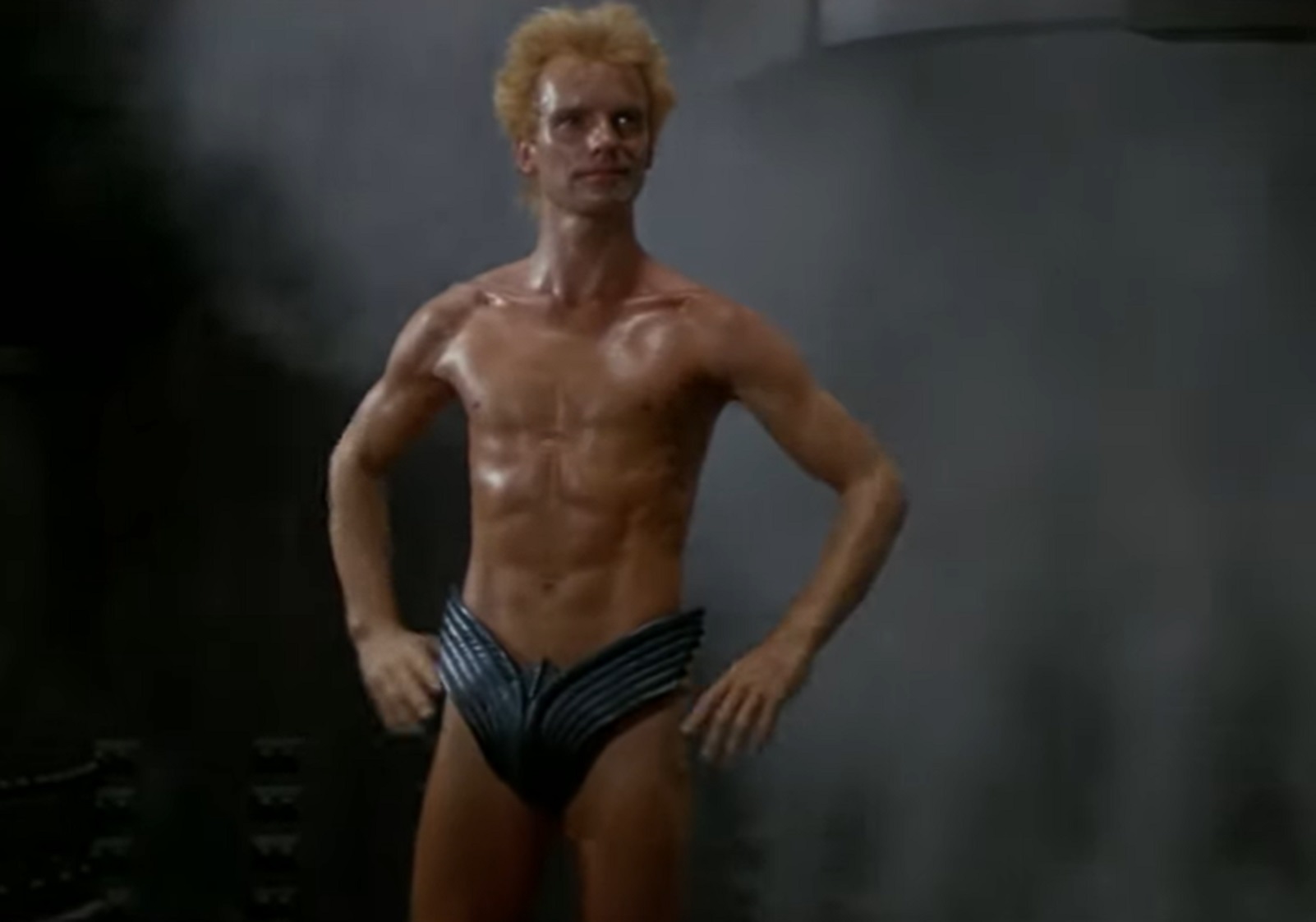 Screenshot: Sting wearing blue futuristic speedos - from Dune (1984)