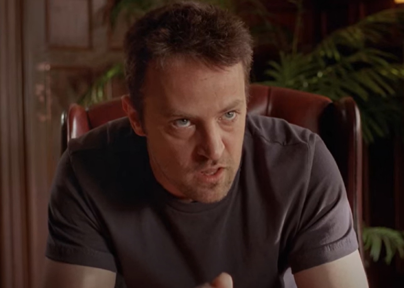 Screenshot: Matthew Perry looking at front with upset face - from Numb (2007).