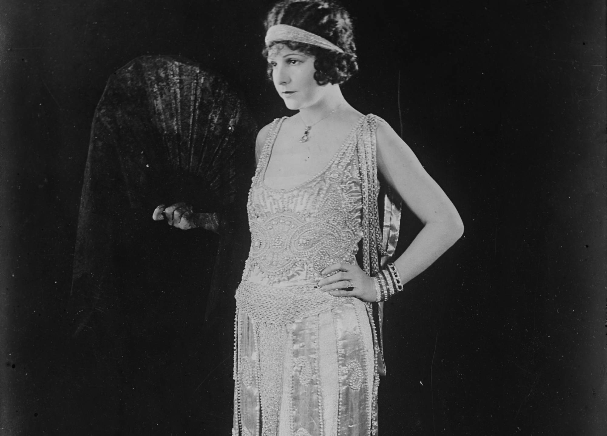Norma Talmadge in dress and hear band