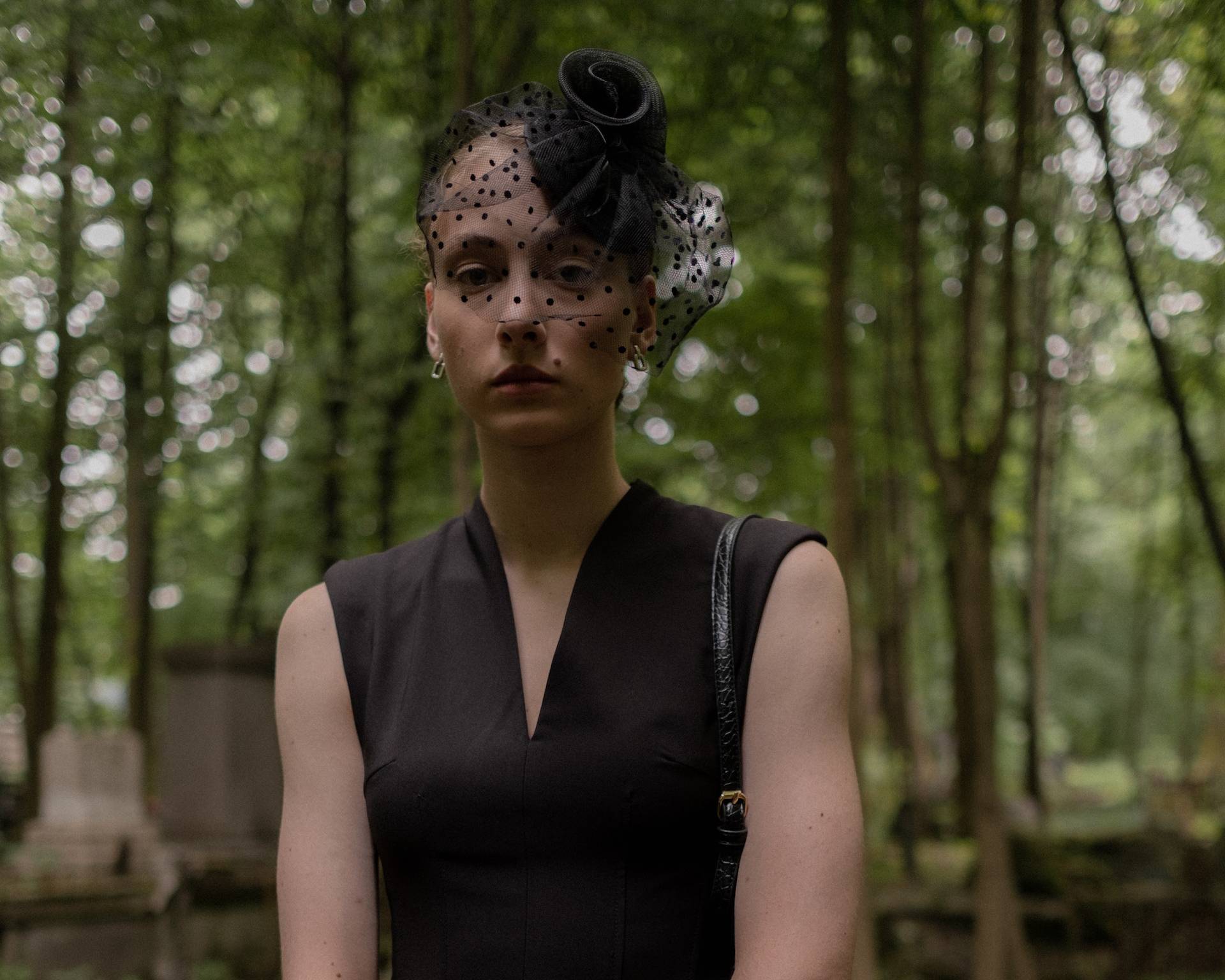 Sad lonely woman in black dress