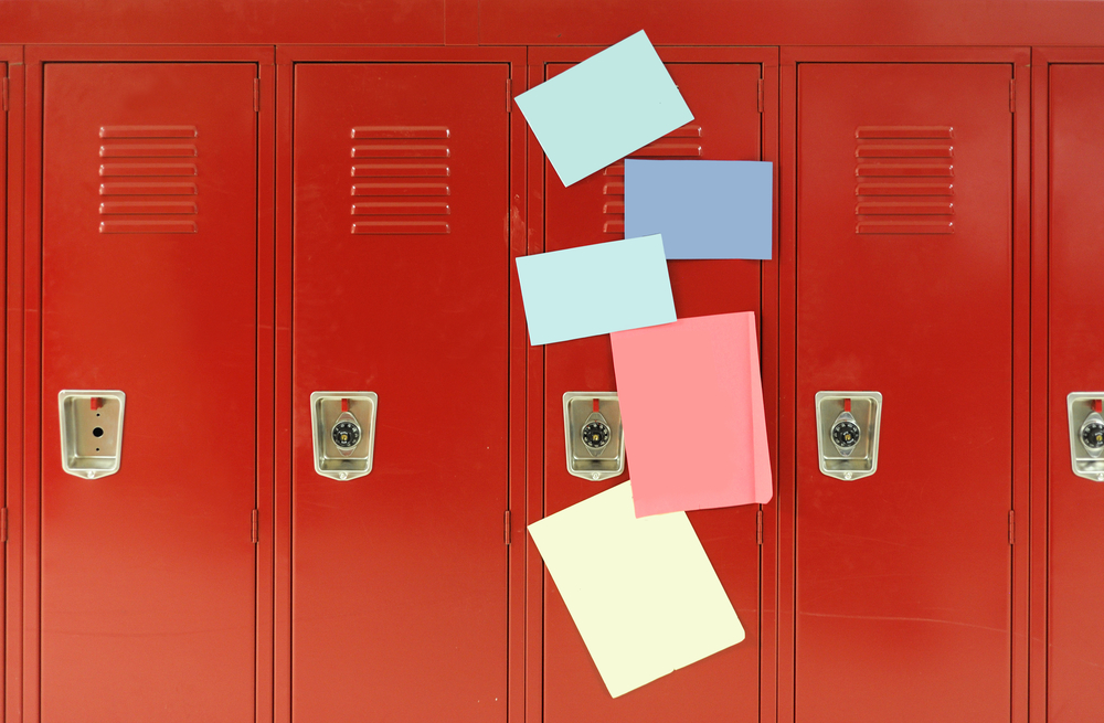 Colorful stickers on red lockers