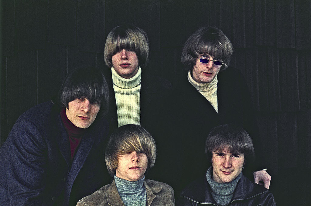 Folk rock group The Byrds (clockwise from top left) Michael Clarke, Jim (Roger) McGuinn, David Crosby, Chris Hillman and Gene Clark pose for a portrait circa 1965 in jackets and similar hair style