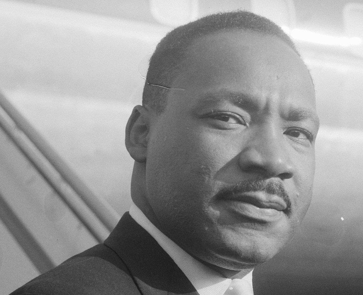Portrait of Martin Luther King wearing suit and looking at camera - 1964