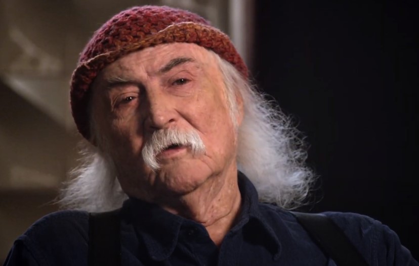 David Crosby in David Crosby: Remember My Name  speaking in blue shirt