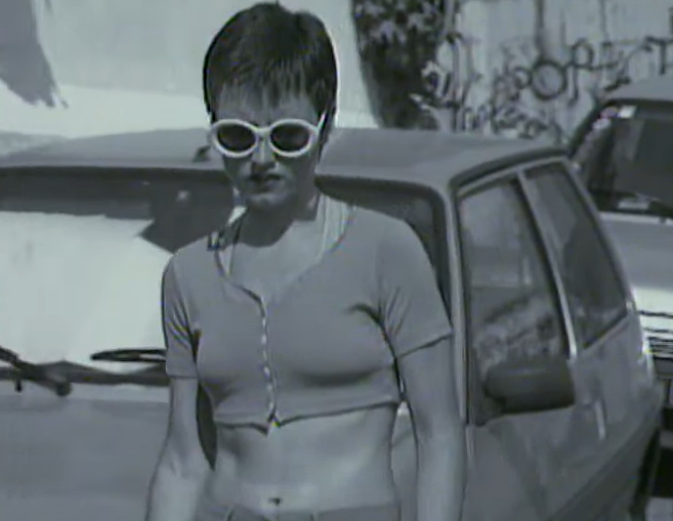 Screenshot: Dolores O'Riordan walking on the street - from Dolores (TV documentary,2018)