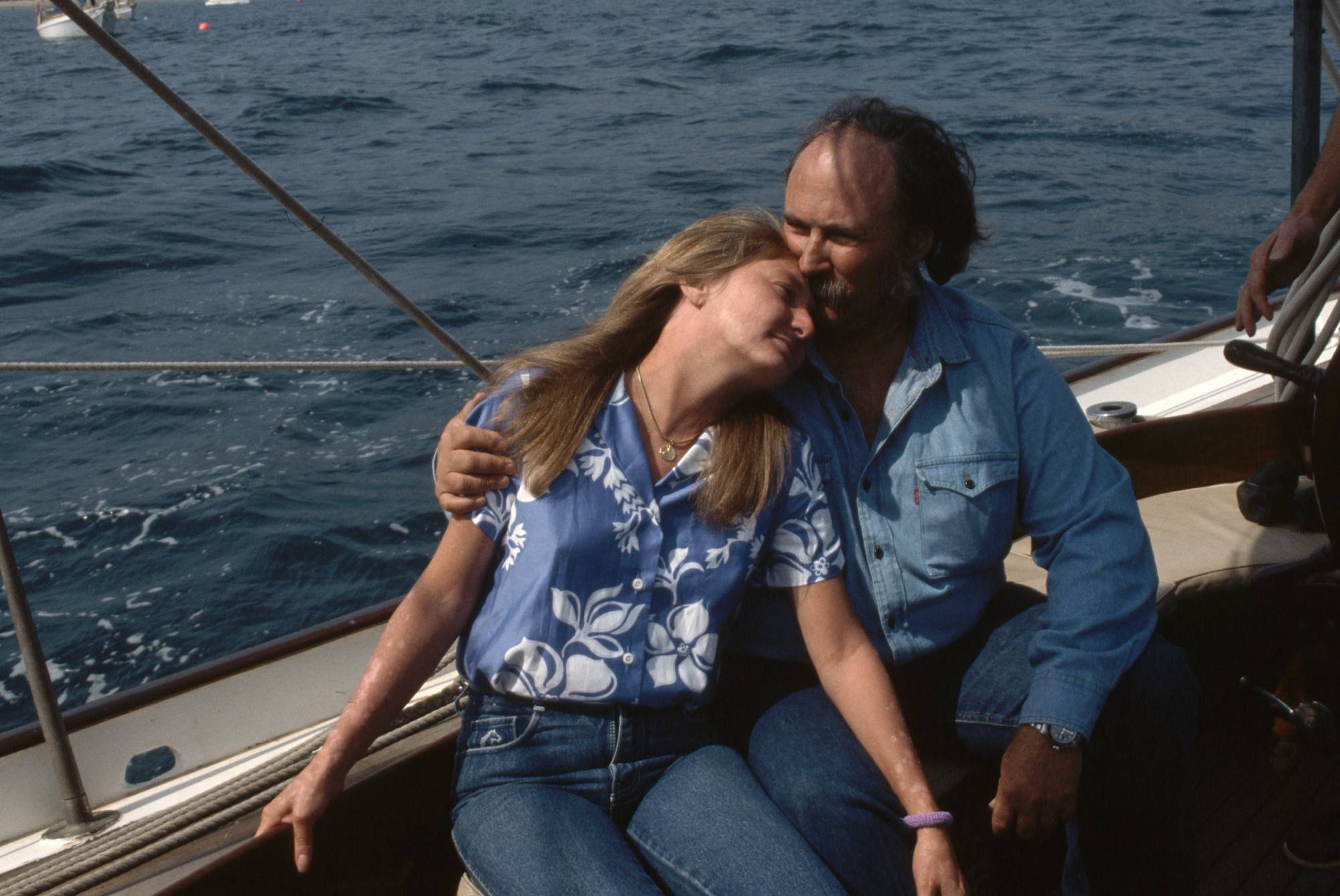 David Crosby poses with his wife-to-be Jan Dance aboard a friend's schooner, the Gallant
