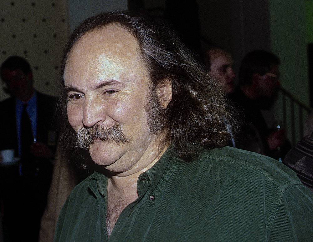 1992 David Crosby at news conference in Washington DC in green shirt