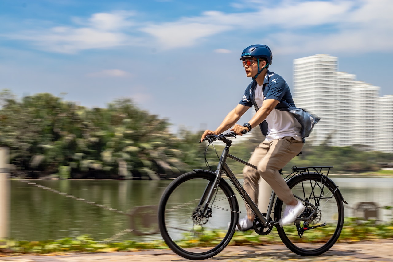 Man riding a bicycle on the street.