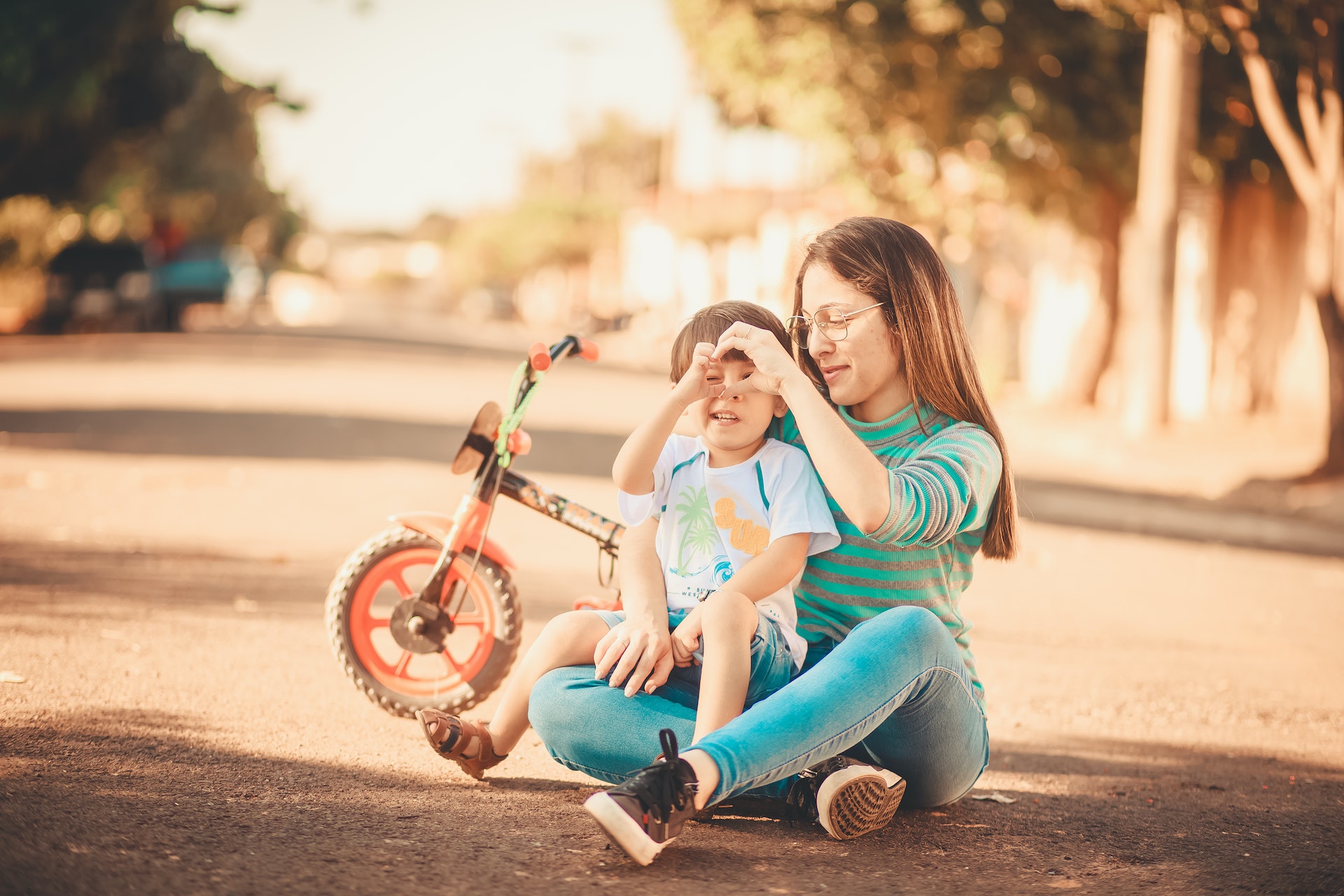 Mother and son playing on the street