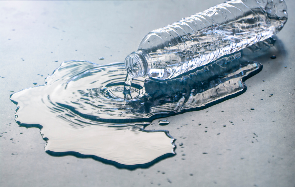 bottle of water spilled