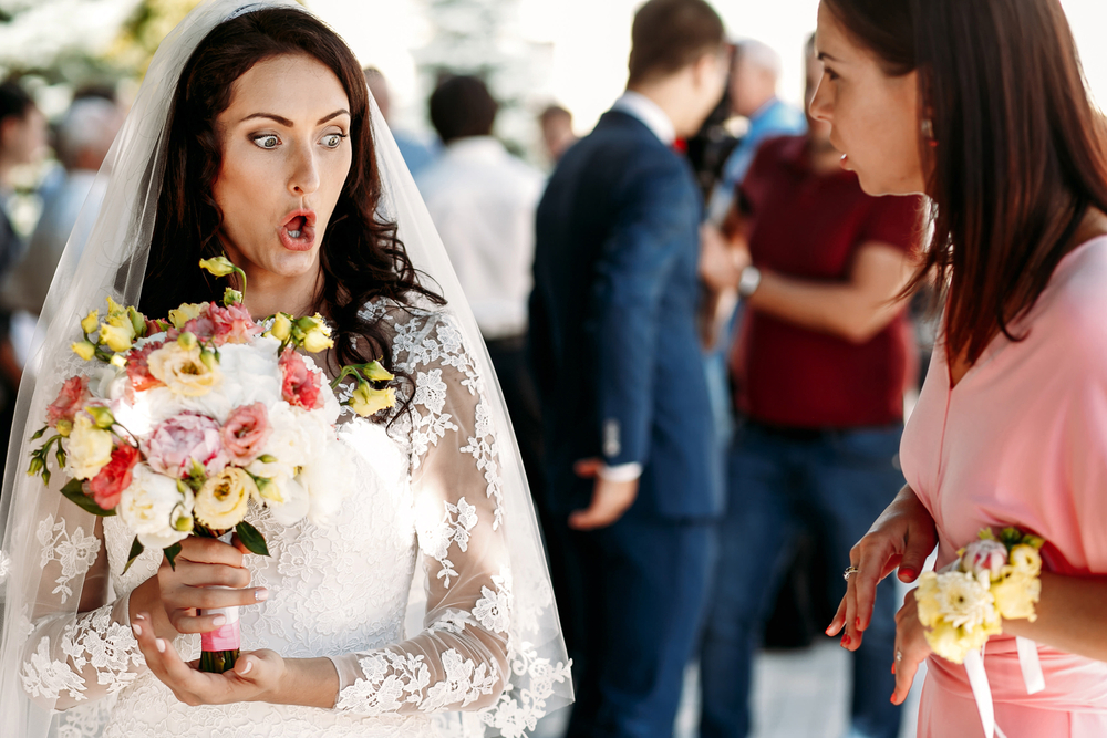Bride makes strange face to wedding guest
