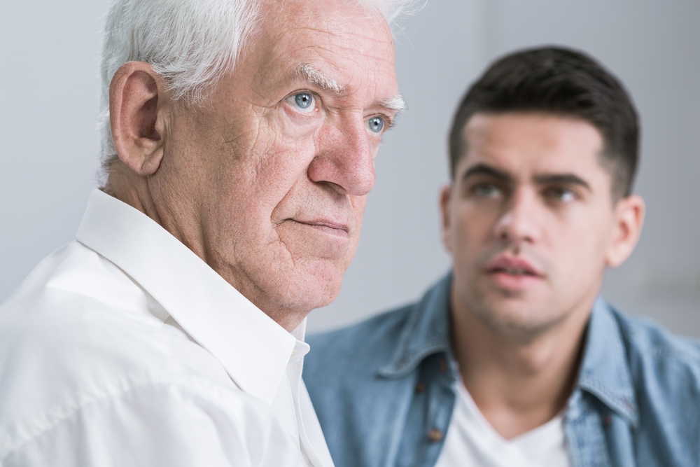 Father and son arguing at home