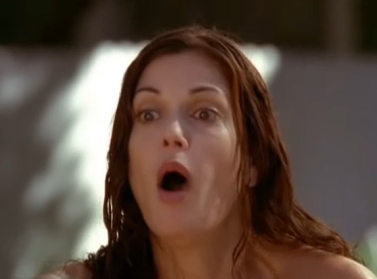 Screenshot: Teri Hatcher with wet hair looking surprised - from Desperate Housewives (2004-2012)