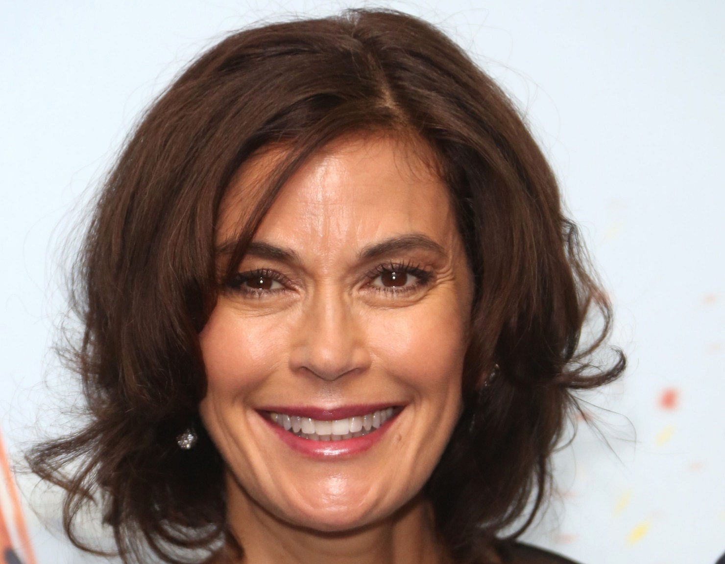 Teri Hatcher wearing transparent dress ,looking at camera and smiling - 2013