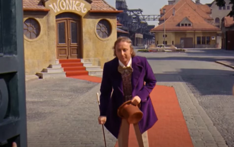 Gene Wilder as  Willy Wonka in purple suit