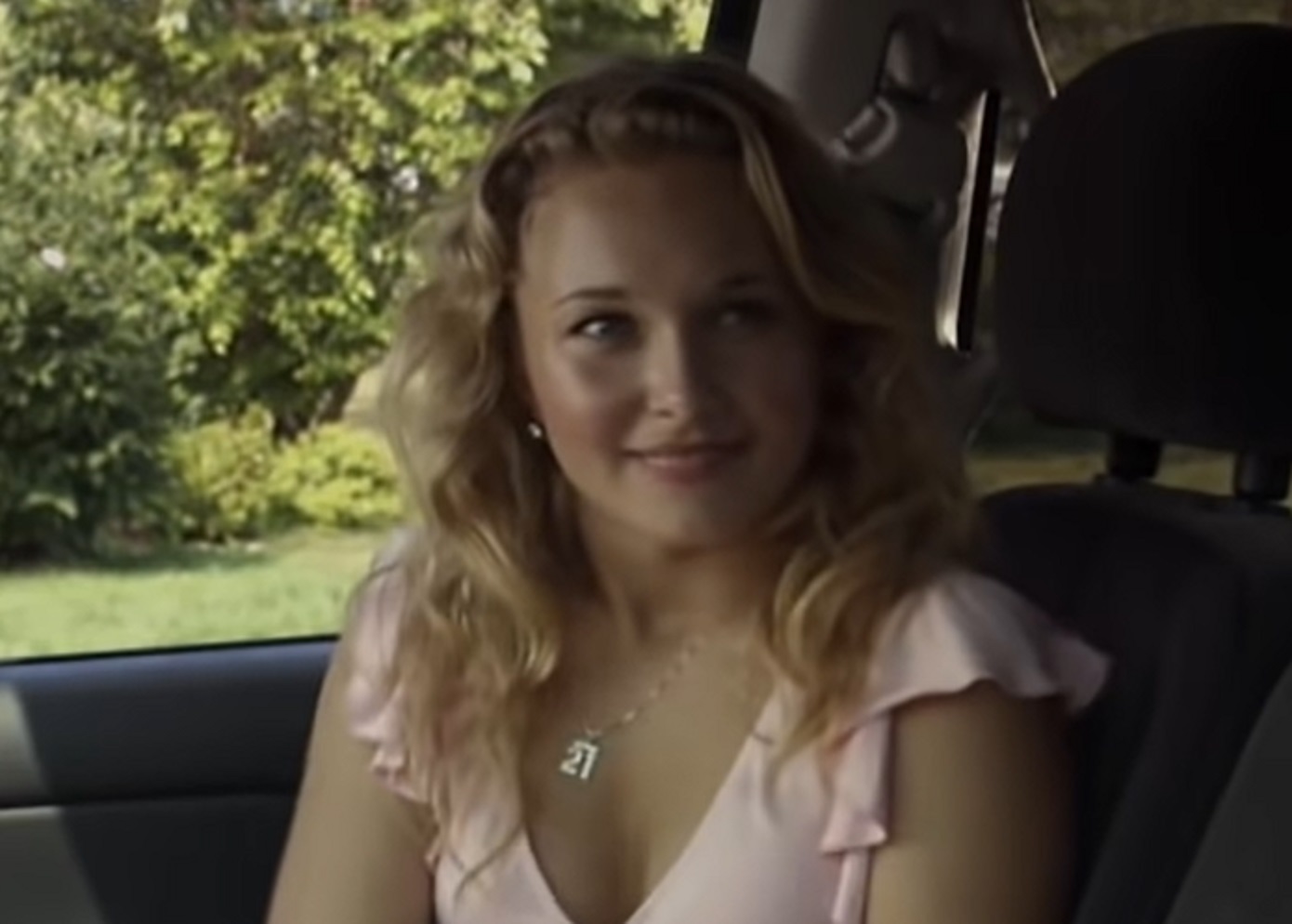 Screenshot: Hayden Panettiere seating in the car and smiling - From The Good Student  2006