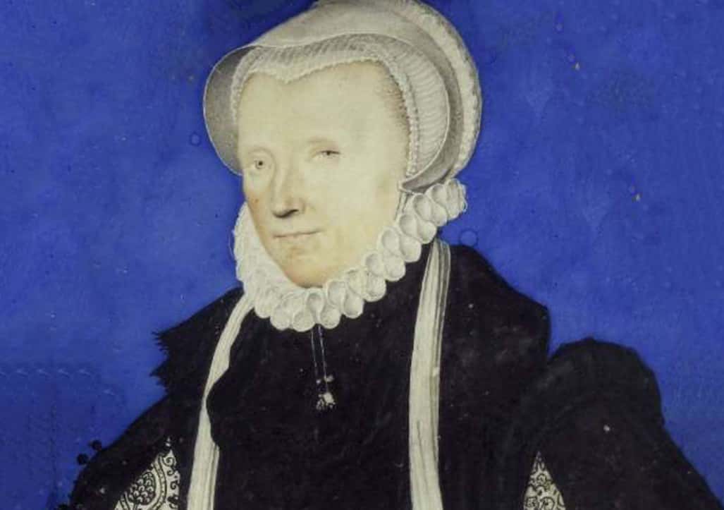 Margaret Douglas  in black dress and white hat