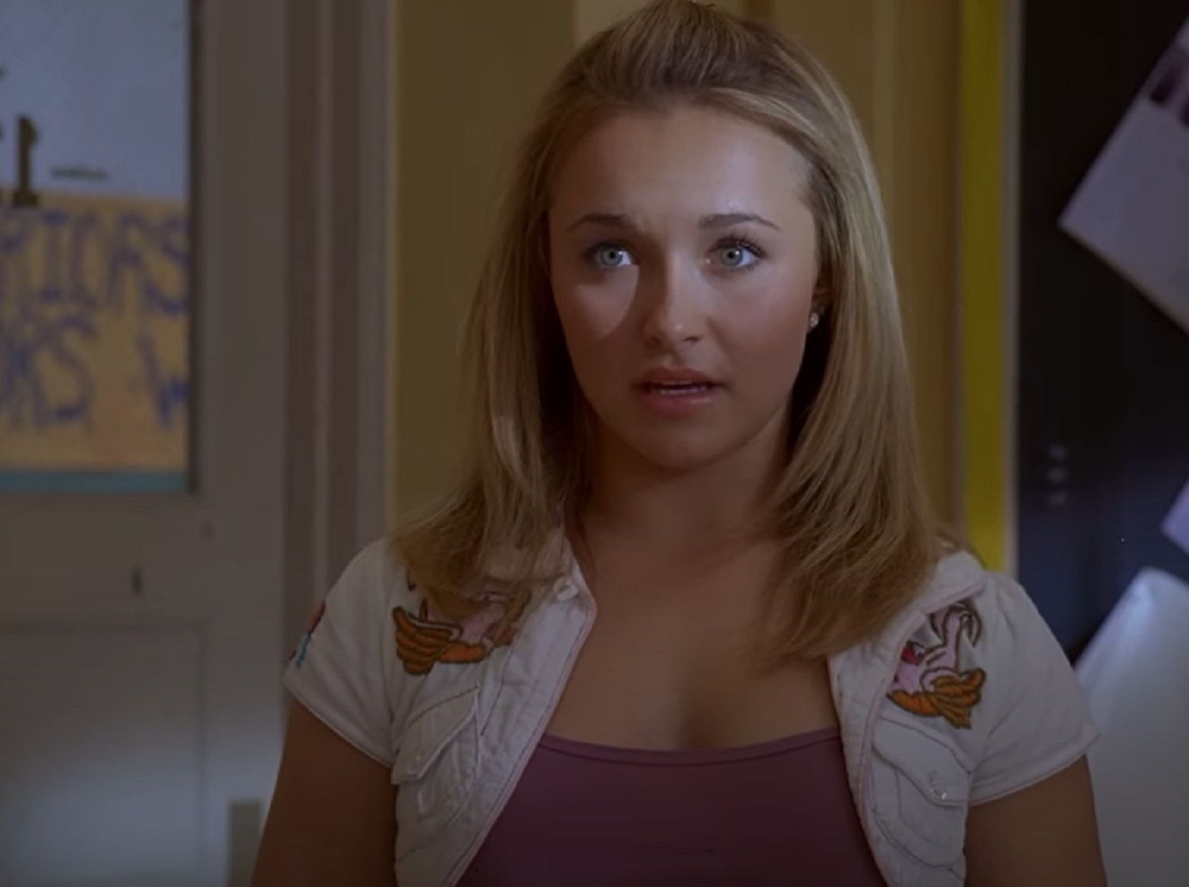 Screenshot: Hayden Panettiere wearing pink top and white jacket looking surprised  - From  Bring It On All Or Nothing (2006)