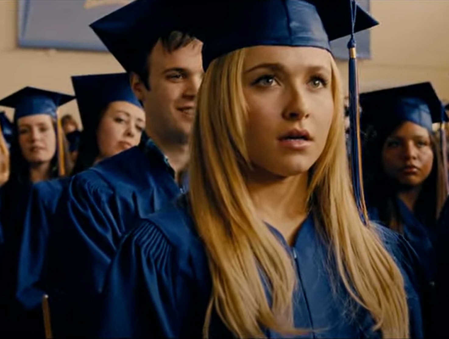 Screenshot: Hayden Panettiere with long blonde hair wearing blue graduation hat and looking surprised - From  I Love You, Beth Cooper  2009