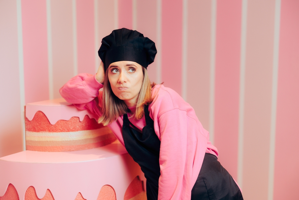 Stressed Overworked Pastry Chef  in pink sweater