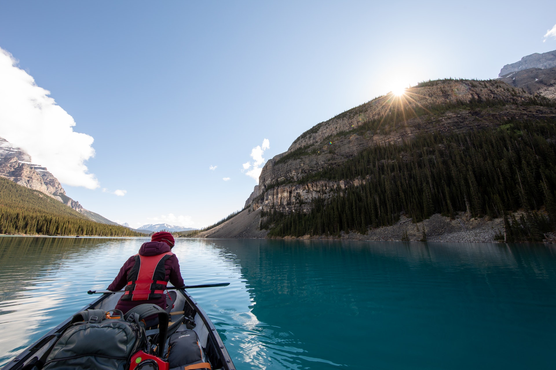 Man in canoe with lot of equipment