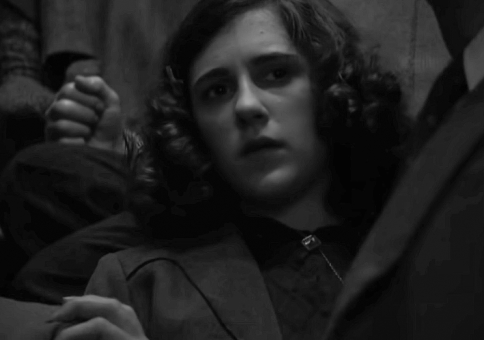Screenshot: B&W photo (Ellie Kendrick) Anne Frank looking at side scared - From BBC ,The Diary Of Anne Frank (2009)
