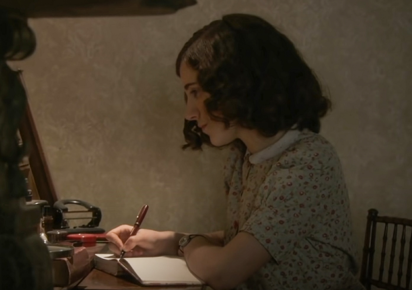 Screenshot: (Ellie Kendrick) Anne Frank writing in her diary - From BBC ,The Diary Of Anne Frank (2009)