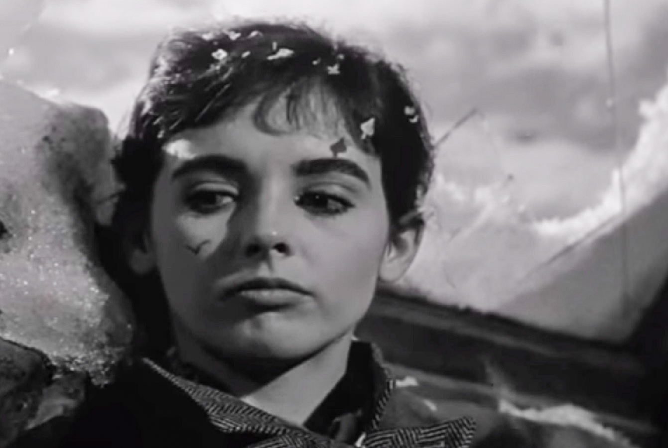 Screenshot: B&W photo (Millie Perkins) Anne Frank looking and sad - From The Diary Of Anne Frank (1959)