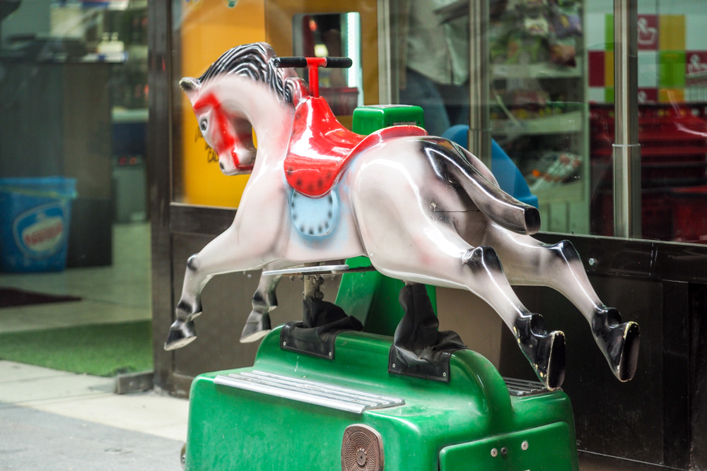 A vintage mini mechanical carousel