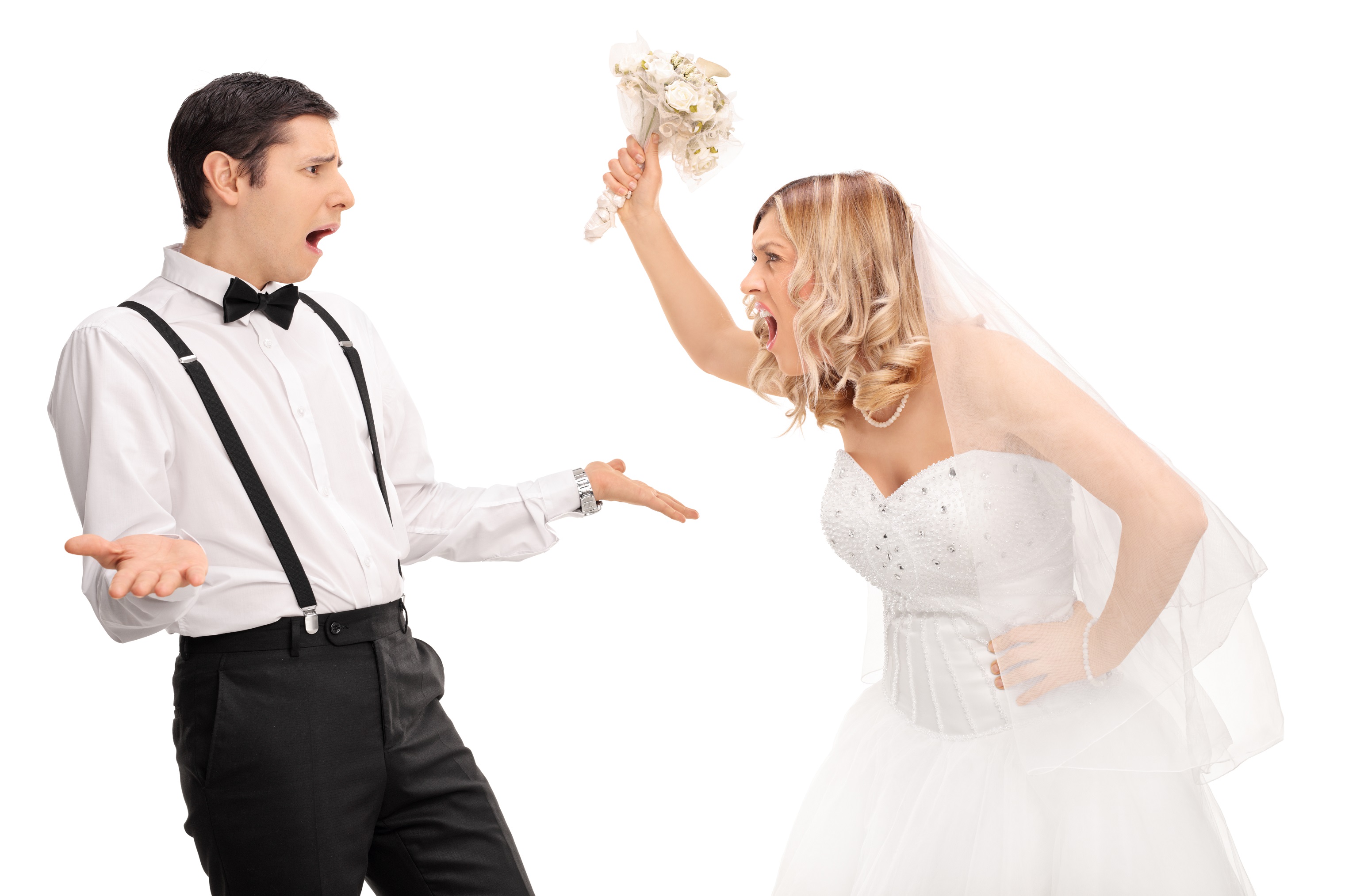 Woman wearing wedding dress and flower yelling and pointing to a man wearing white shirt and tie looking surprised.