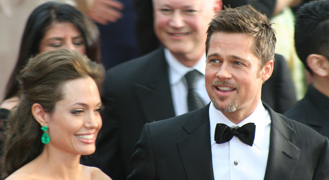Actors Angelina Jolie and Brad Pitt at the 81st Academy Awards in formal clothes