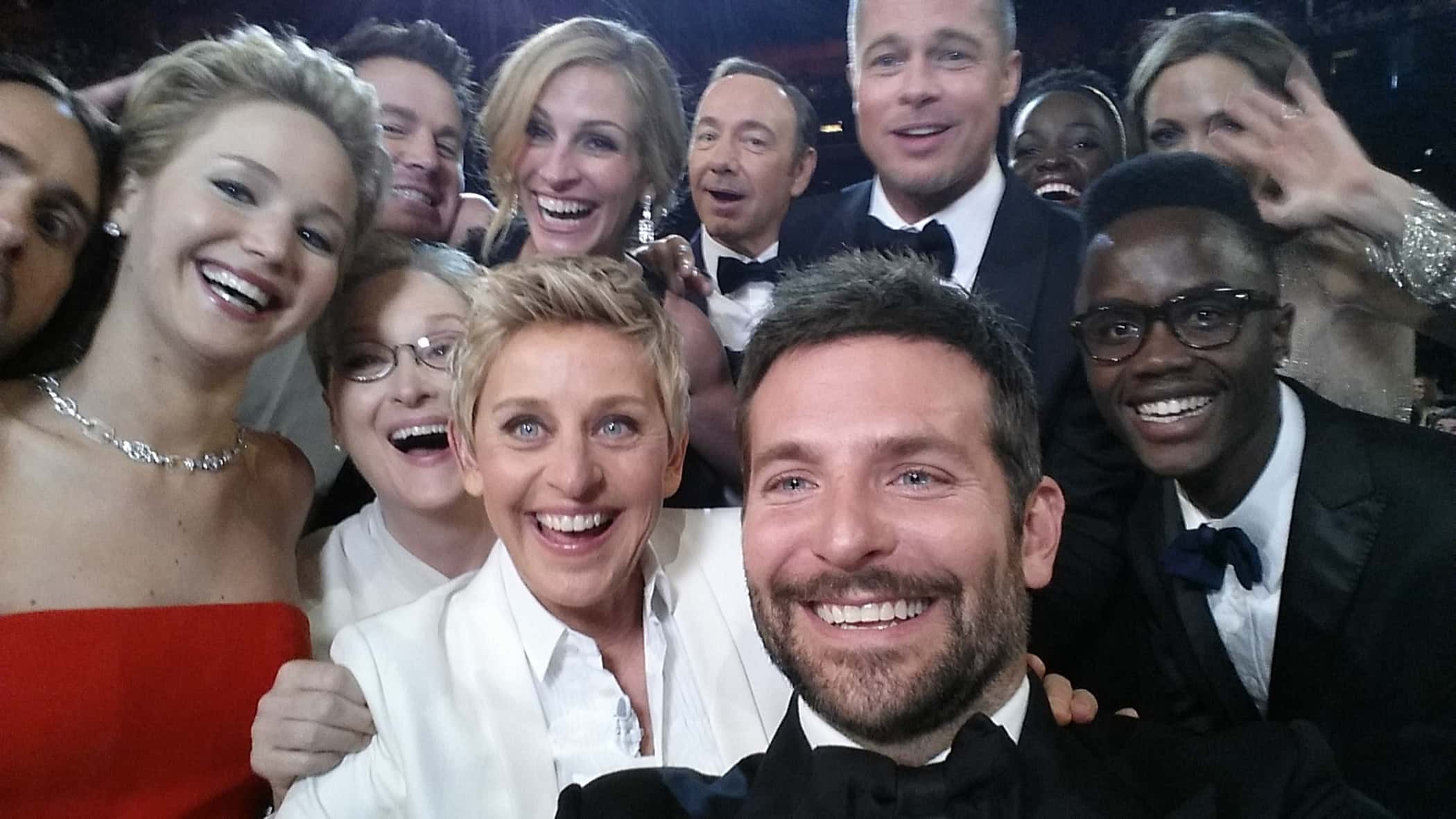 provided by Ellen DeGeneres, host Ellen DeGeneres poses for a selfie taken by Bradley Cooper with lot of actors