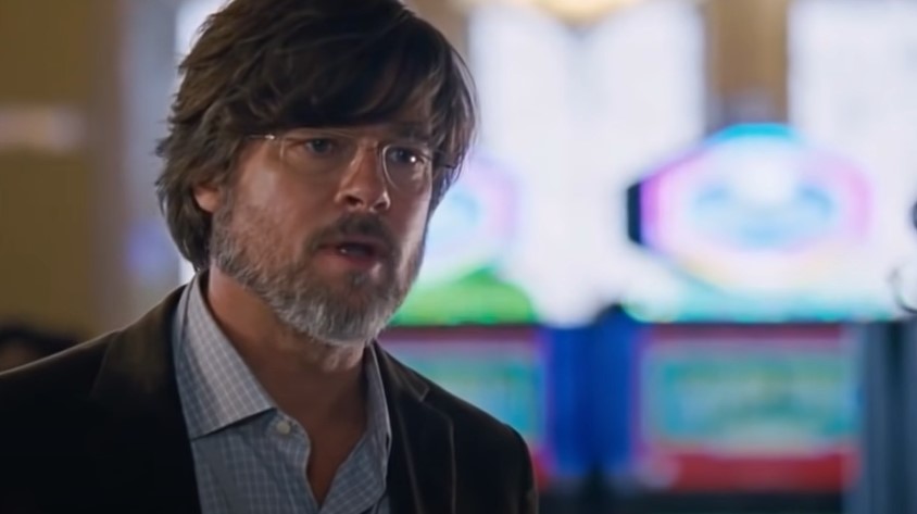 Brad Pitt in The Big Short in shirt and jacket angry
