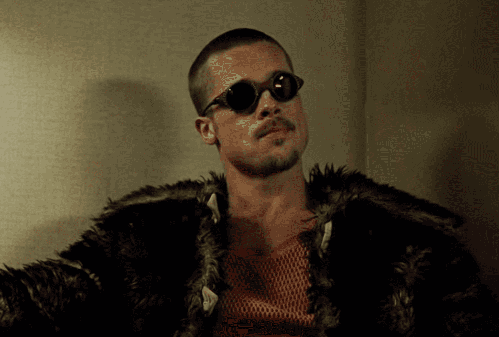 Brad Pitt in Fight Club in coat and glasses