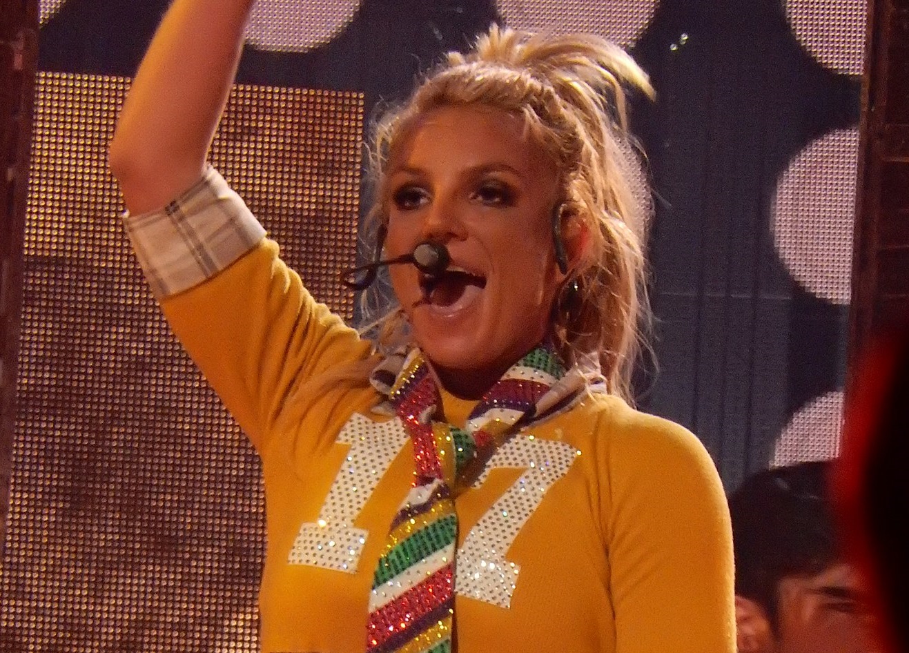 Britney Spears is performing live ,looking at side - 2016