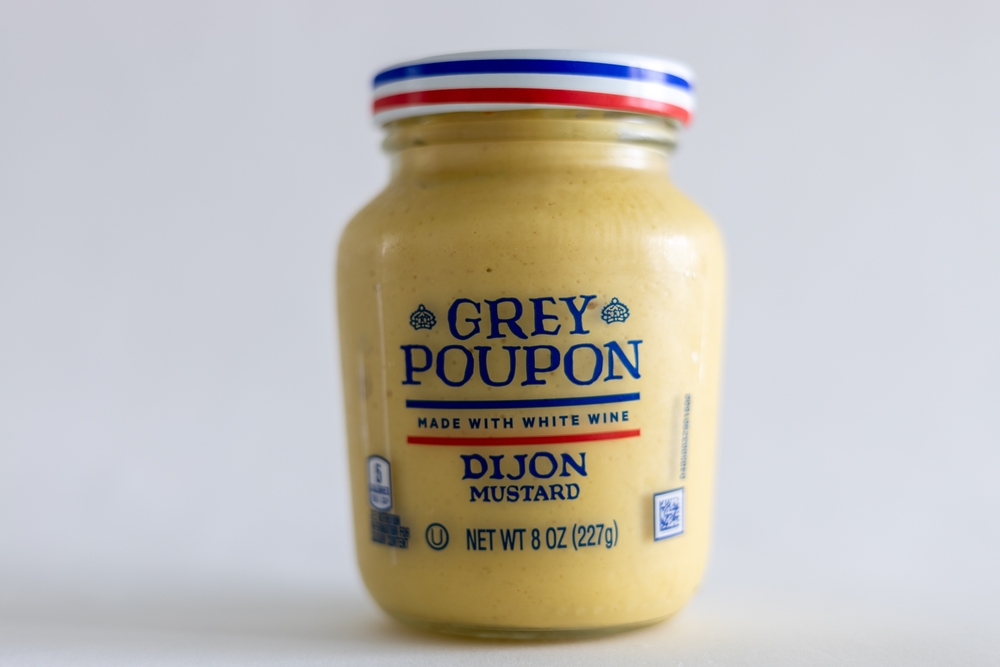 Jar of Grey Poupon dijon mustard