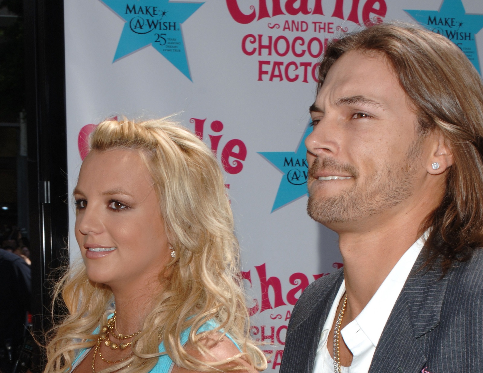 Britney Spears wearing blue shirt and golden necklace walking with Kevin Federline in grey suit - 2005