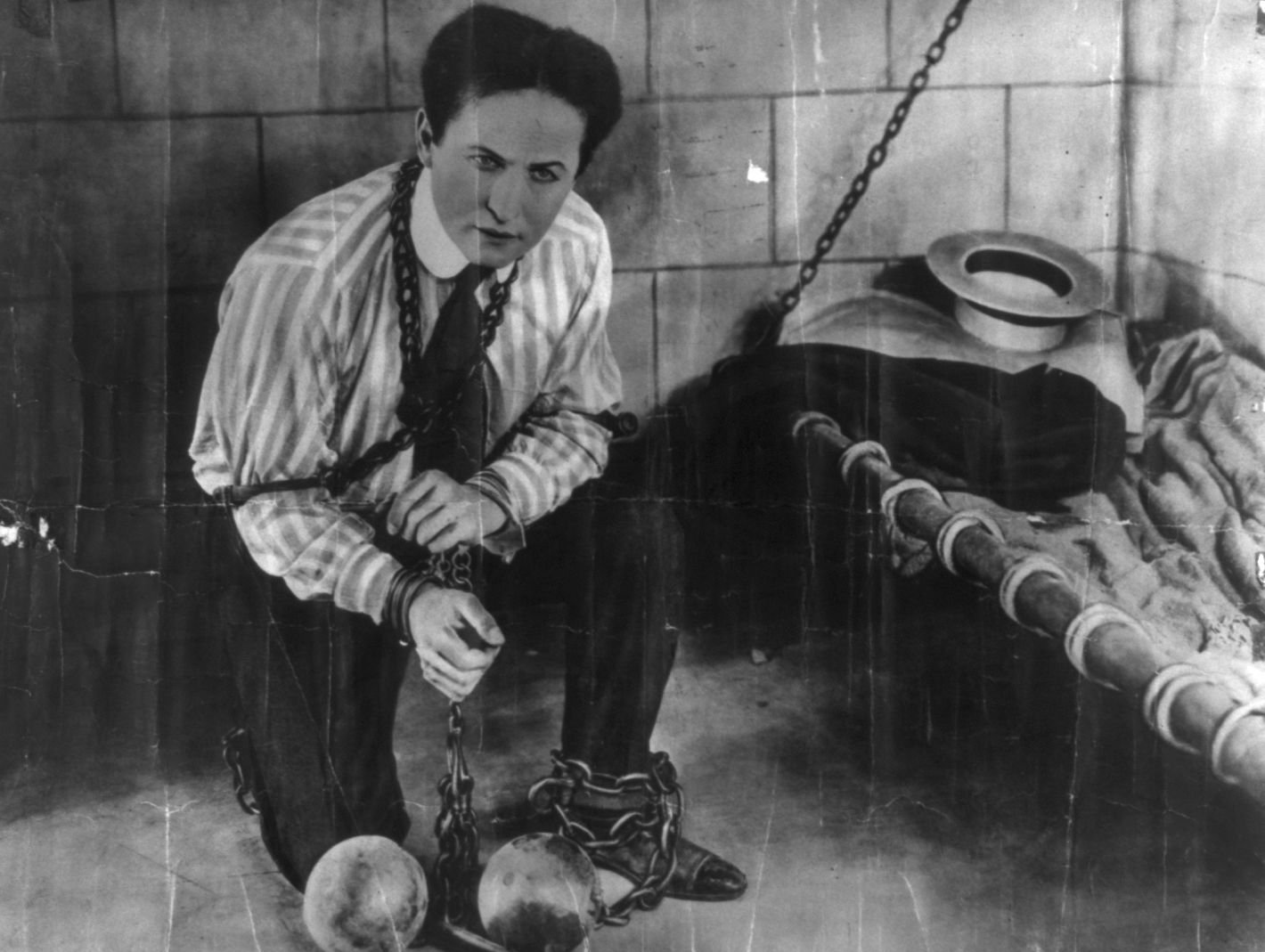 Harry Houdini in chains in prison