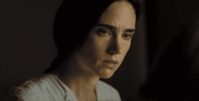 Jennifer Connelly as  Emma Darwin In Creation speaking to someone at night