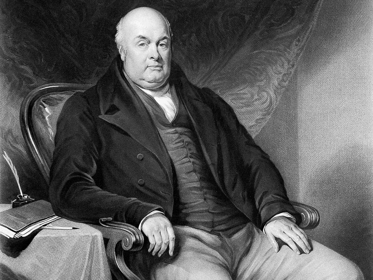 Portrait of Robert Waring Darwin in suit sitting on an armchair